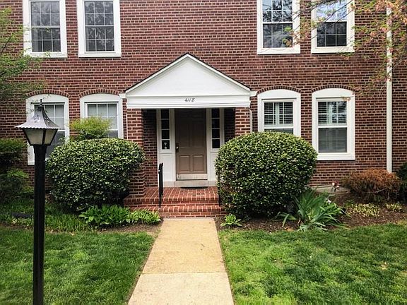4118 36th Street South A1, one of four condos in an small building/ low density/ high privacy. Photo shows Main entrance to Foyer, and details 
 are kept as the National Architecture Award was awarded .Entrance to Foyer light posts,door, gardens.