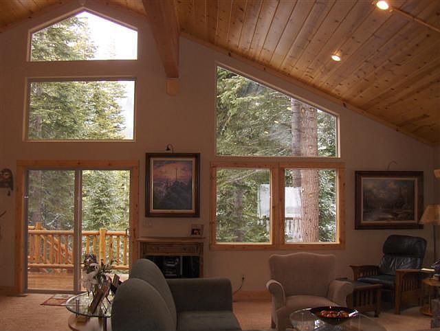 Living room with floor to ceiling windows