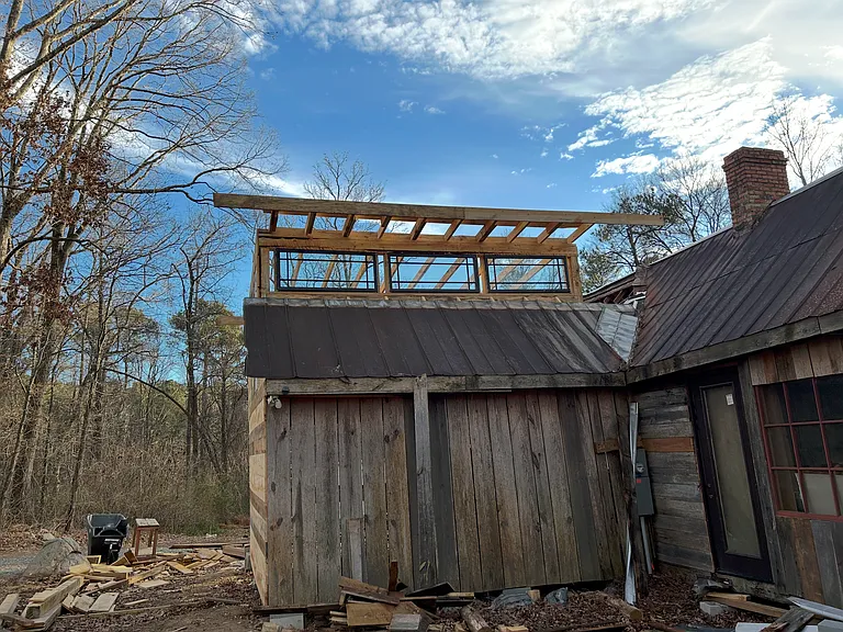 new clerestory roof with wall of windows