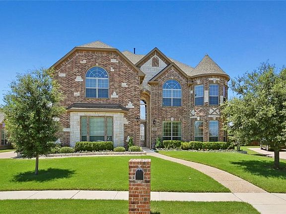 THE MANICURED LANDSCAPING IS ENHANCED BY NUMEROUS ADDITIONAL JUNCTION BOXES ADDED BY THE SELLERS TO LIGHT UP THE EXTERIOR AT NIGHT!