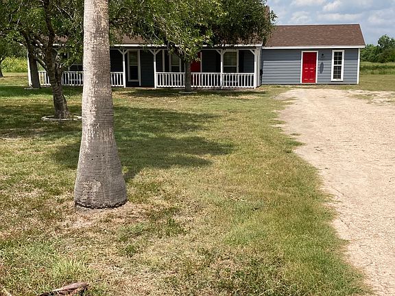 Country home with wrap around porch on 5 acres.
