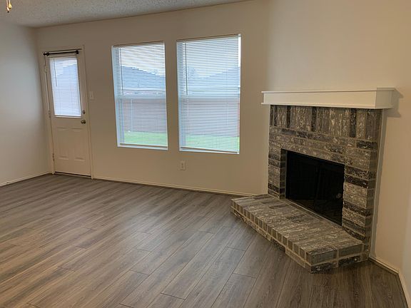 Living room looking out to spacious back yard.