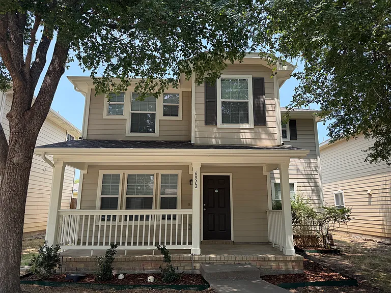Front of house with a nice big porch
