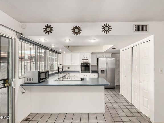 5th image of 7883 N 49TH Avenue