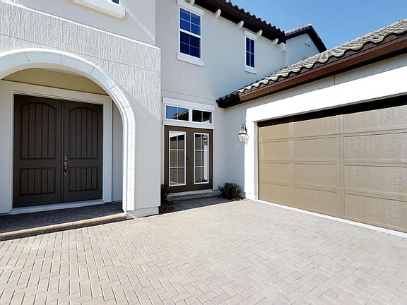 Custom Augusta Entrance and Garage - Tamaya