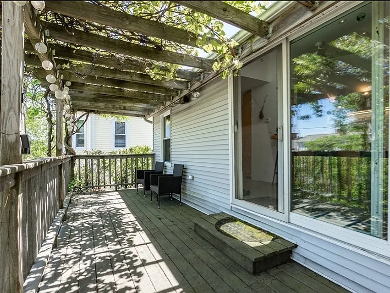 Side deck with grape arbor