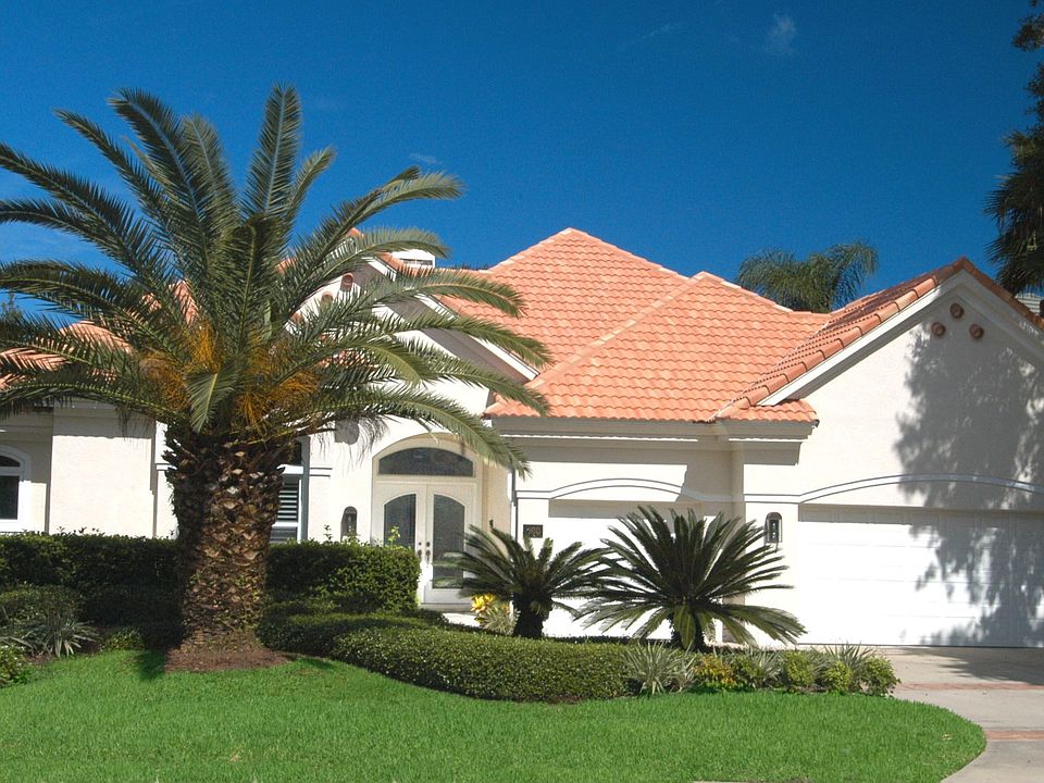 Attractive 3BR Courtyard Home with Pool on a Sparkling Lagoon