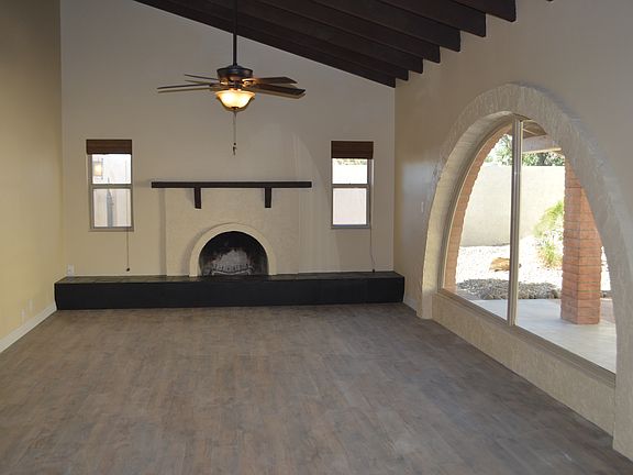 Great room with fireplace & courtyard view