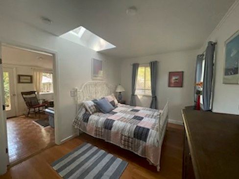 Bedroom with architectural skylight