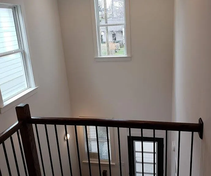View of front door from upstairs landing (office is directly behind photographer)