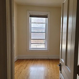 View into the Smaller Bedroom (facing East).