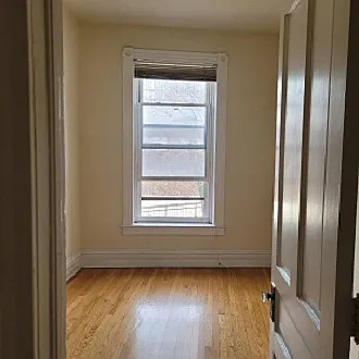 View into the Smaller Bedroom (facing East).