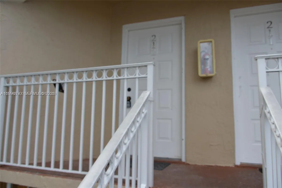 Building Photo - 8695 NW 6th Ln #2-212