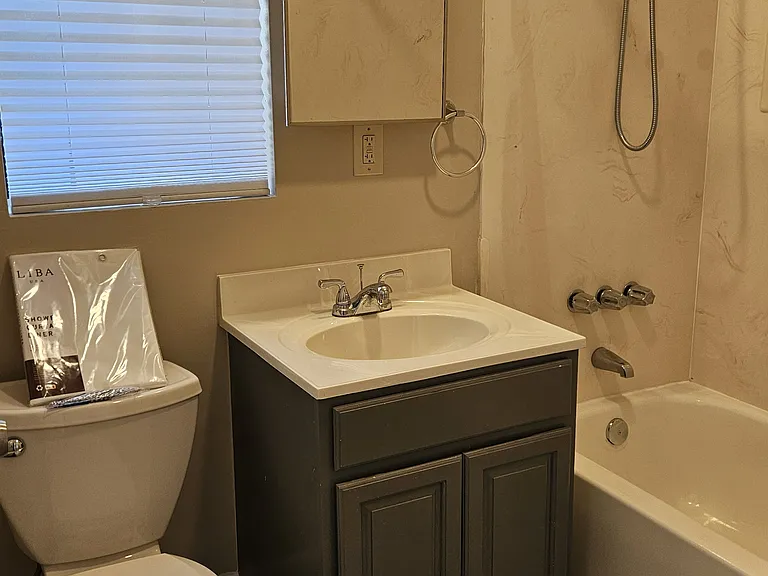 Master bathroom with newly tiled floor