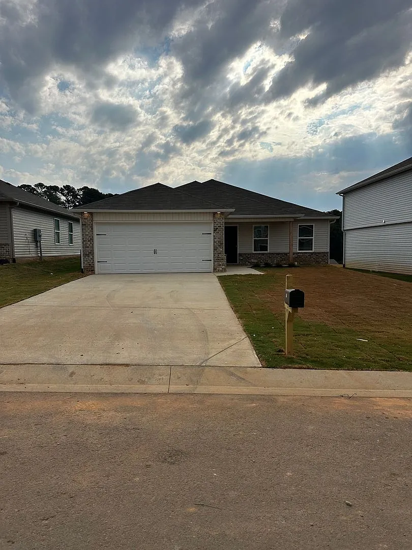 Discover Lincoln Living at Its Finest! Charming 3-Bedroom, 2-Bath Home in Deer Brook Crossing — Photo 4