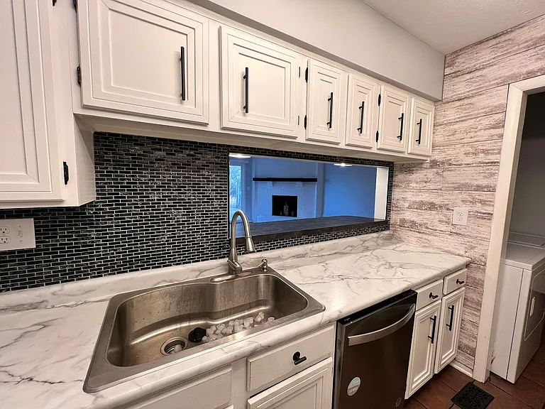 7770 Sterling Pl — Photo 5