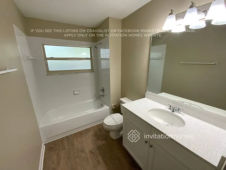 9713 Peabody Dr N — Photo 16