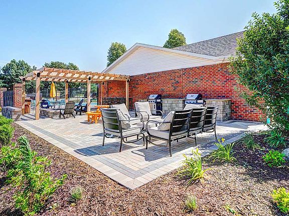 Gather, grill, and unwind in our inviting community patio space with outdoor dining and fire pit seating.