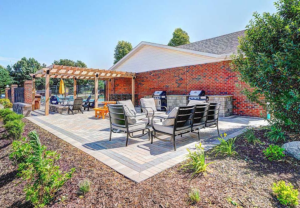 Gather, grill, and unwind in our inviting community patio space with outdoor dining and fire pit seating.