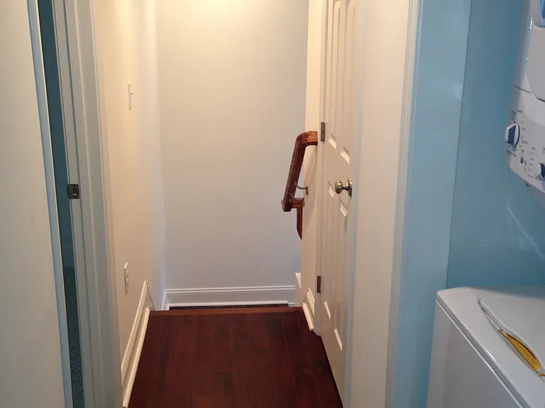 3rd floor hallway, showing stackable washer/dryer