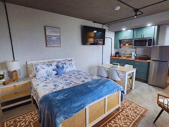 The perfect seaside retreat with cozy seating and a fully equipped interior.