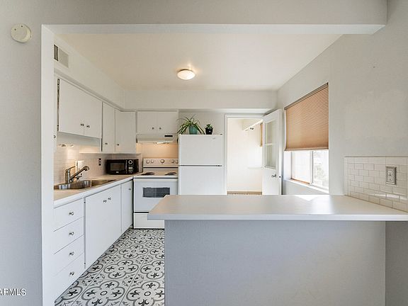 4th image of 8221 E GARFIELD Street #L208