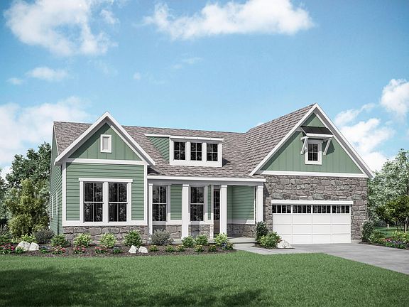 new home with front porch and dormer