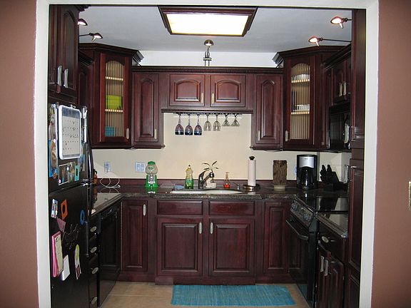 Updated kitchen-granite counters/beautiful cherry cabinets..spacious!