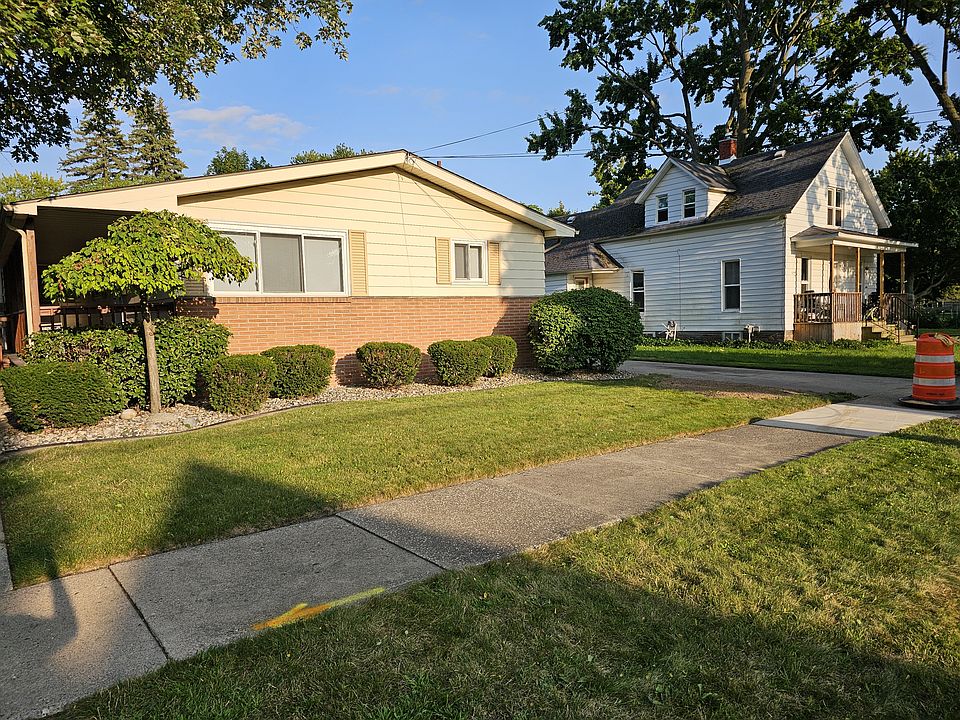 Outside view. Driveway is on the right.