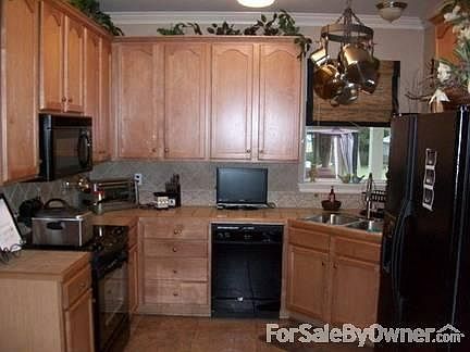 Living Room
						:
						Arch detailed opening from Foyer.