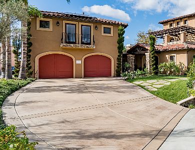 Apartment is above the two red doors on the detached garage