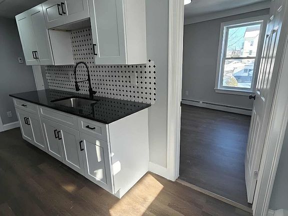 1st room off Kitchen (Great for Bedroom/Dining/Home Office)