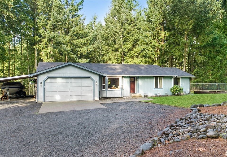 Spacious driveway offers lots of parking. No HOA here. Park your RV and all of your toys. 