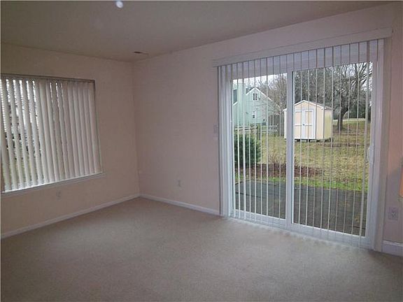 Dining Room with Sliders to Back Yard
