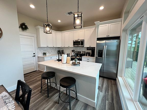 Modern kitchen with stainless steel appliances