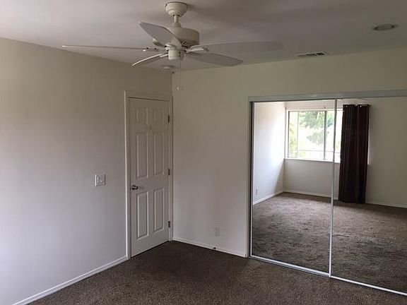 Master bedroom 11.5' x 14', overlooking patio