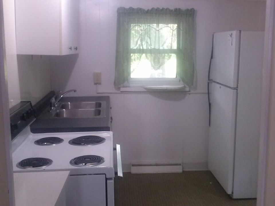 Kitchen area with backyard exit