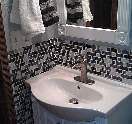bathroom with glass tile