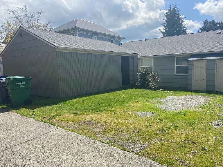 Alley accessed off-street parking and storage garage