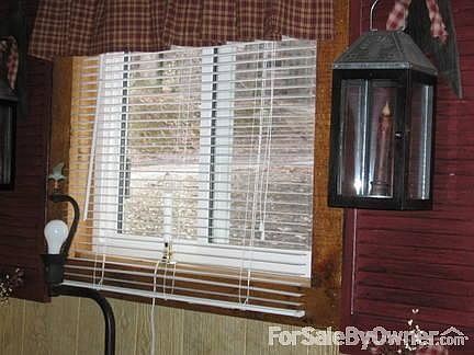 Above wood is loft area access in hall