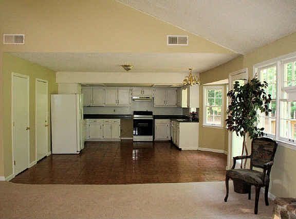 Great room looking into kitchen breakfast area.