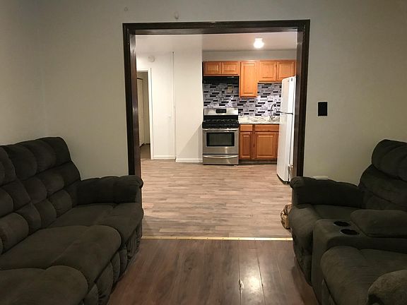 Living room looking at kitchen.