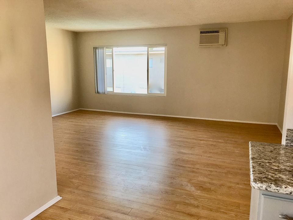 Spacious & Bright unit in center of building, overlooking pool & courtyard.
