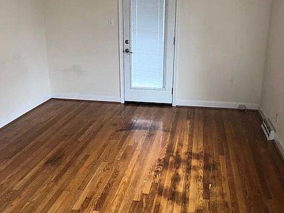 LIVING ROOM, DOOR LEADS TO SCREENED PORCH
