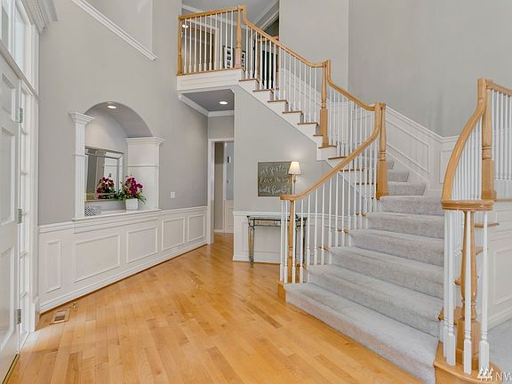 Grand 2-story entry...additional back staircase leads to secondary bedrooms and bonus