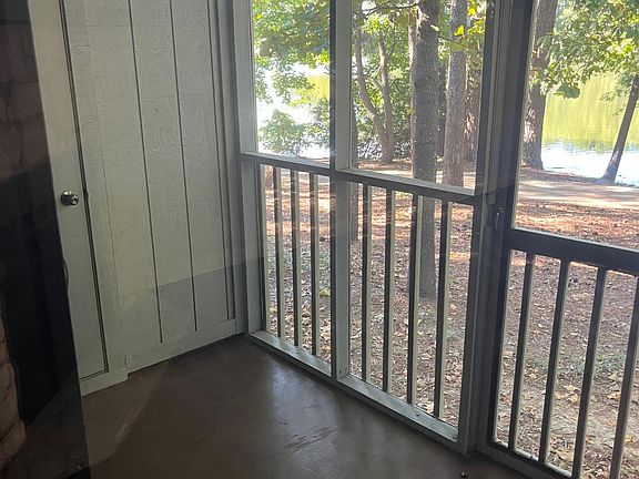 lovely screened in porch overlooking the Harbison lake/pond and the walking trails