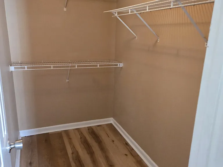 Walk-in closet primary bedroom