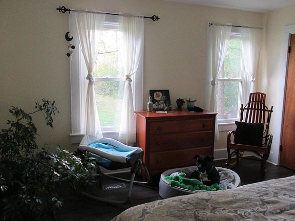 bedroom with large closet with washer dryer hookup