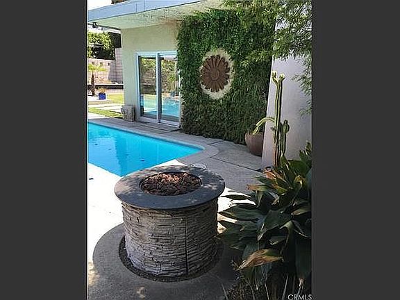 Pool area with fire pit