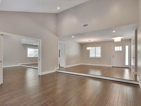 Formal Living Room with Dining Area view and open concept to family room